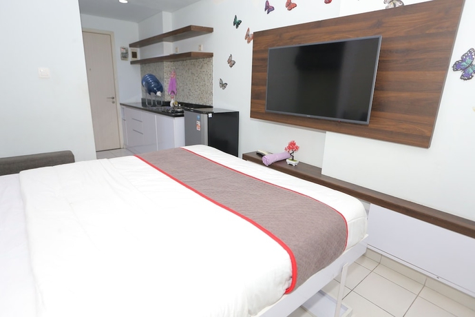 Imagen de la habitación del Hotel Capital O 93594 Pelangi Urbano. Foto 3