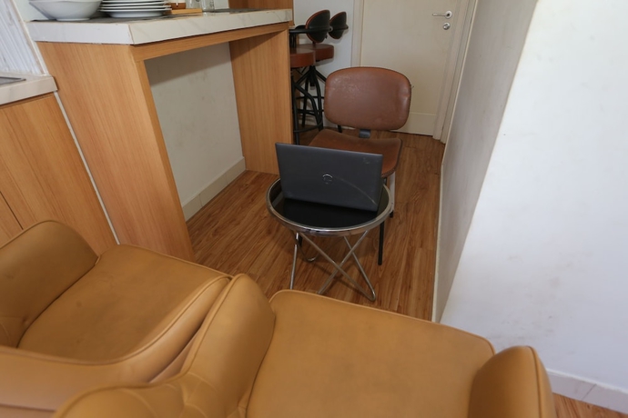 Imagen de los interiores del Hotel Capital O 93594 Pelangi Urbano. Foto 14
