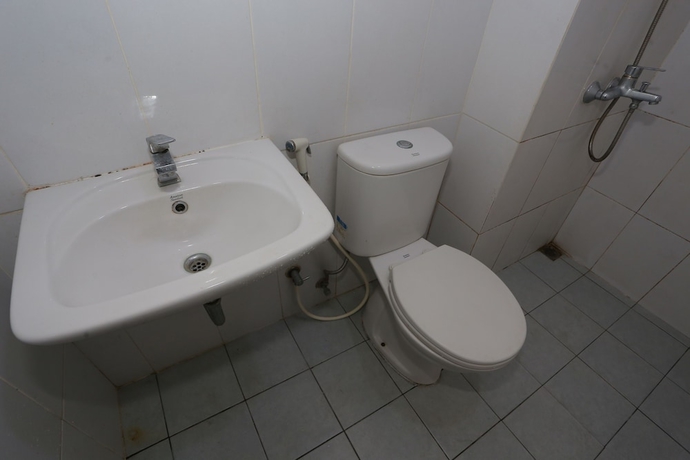 Imagen de la habitación del Hotel Capital O 93594 Pelangi Urbano. Foto 6