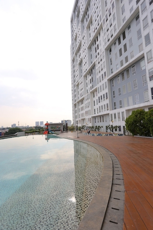 Imagen de la piscina del Hotel Capital O 93594 Pelangi Urbano. Foto 18