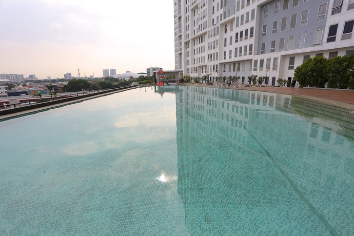 Imagen de la piscina del Hotel Capital O 93594 Pelangi Urbano. Foto 19