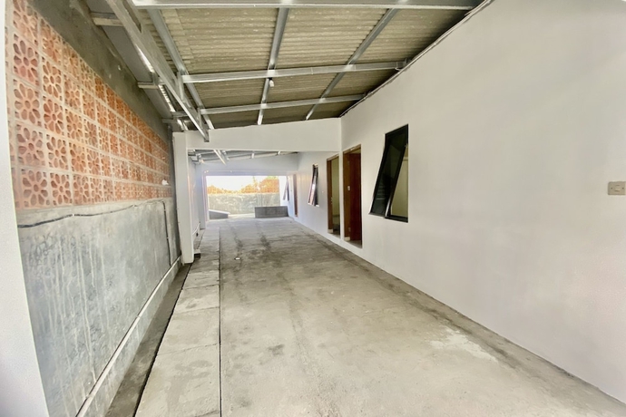 Imagen de los interiores del Hotel Capital O 93601 Manda Homestay. Foto 16