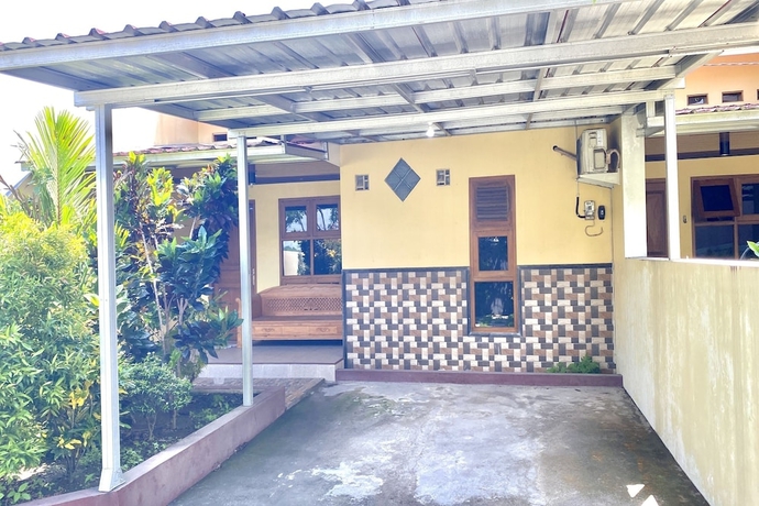Imagen de los interiores del Hotel Capital O 93601 Manda Homestay. Foto 17