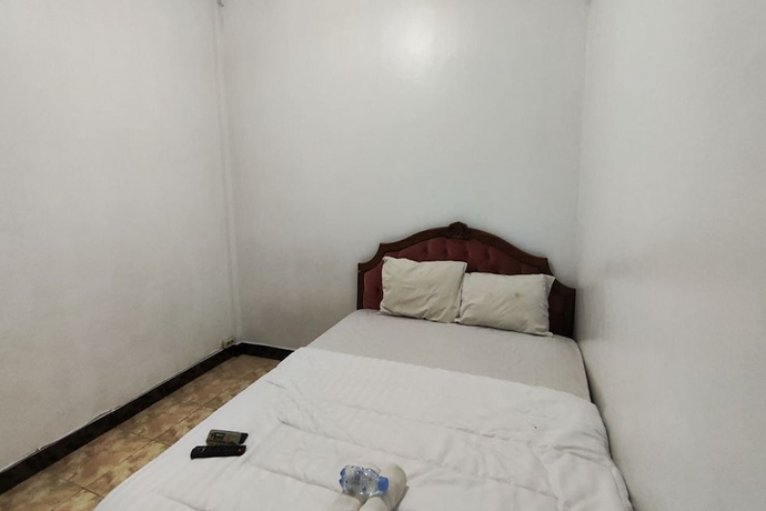 Imagen de la habitación del Hotel Capital O 93653 Kinasih. Foto 4