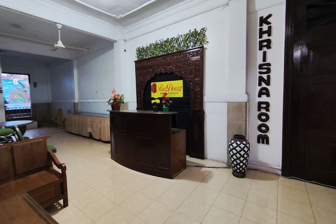 Imagen de los interiores del Hotel Capital O 93653 Kinasih. Foto 12