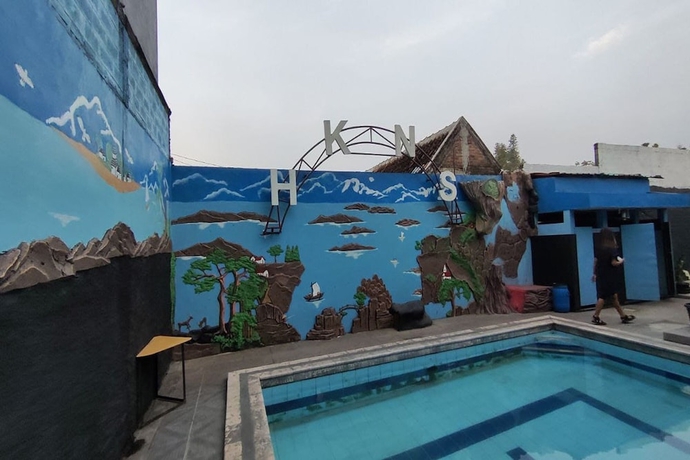 Imagen de la piscina del Hotel Capital O 93653 Kinasih. Foto 18