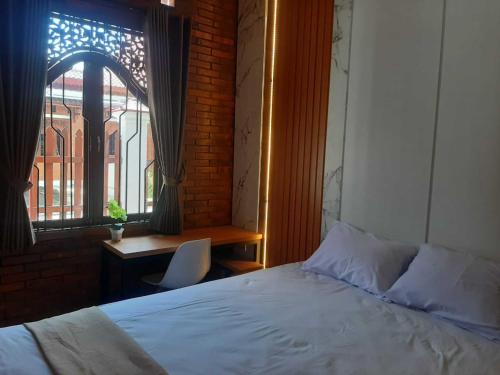 Imagen de la habitación del Hotel Capital O 93719 Homestay Omah Bidadari. Foto 20