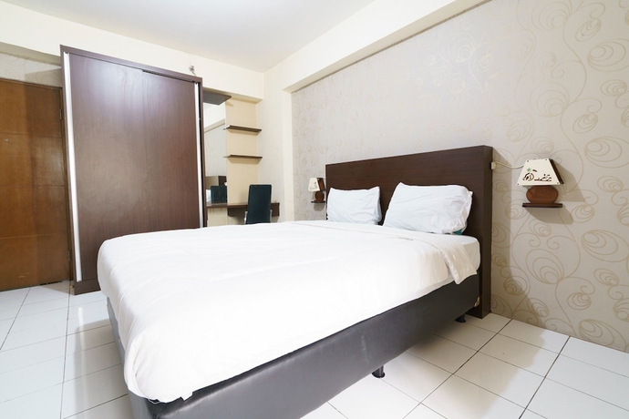 Imagen de la habitación del Hotel Capital O 93760 Apartemen Gateway Cicadas By Jh Group. Foto 4