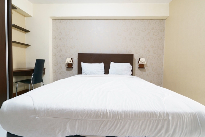 Imagen de la habitación del Hotel Capital O 93760 Apartemen Gateway Cicadas By Jh Group. Foto 9