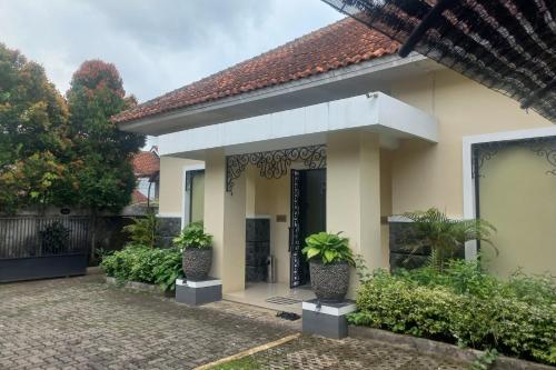 Imagen general del Hotel Capital O 93872 Natura Guest House Syariah. Foto 5