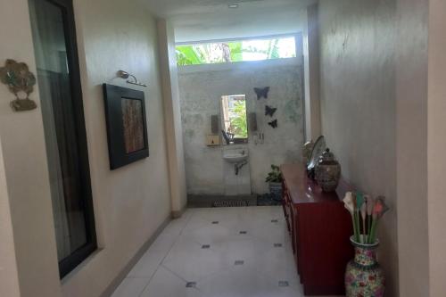 Imagen general del Hotel Capital O 93872 Natura Guest House Syariah. Foto 17