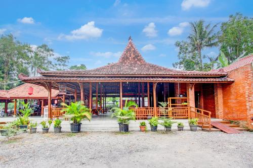 Imagen general del Hotel Capital O 93873 Sokkyo Homestay. Foto 2