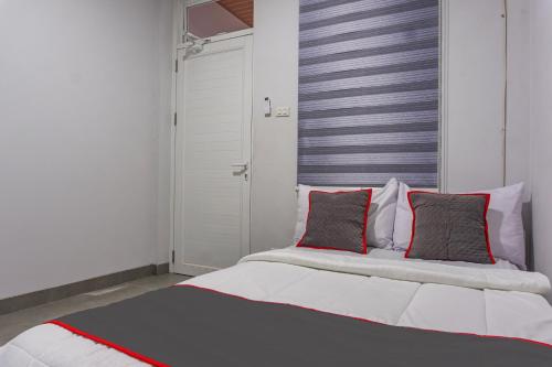 Imagen de la habitación del Hotel Capital O 93991 Hakobox Kostel. Foto 18