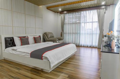 Imagen de la habitación del Hotel Capital O 93991 Hakobox Kostel. Foto 20