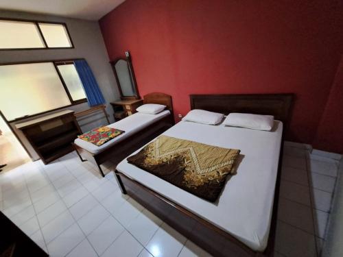 Imagen general del Hotel Capital O 94108 Abadi. Foto 14