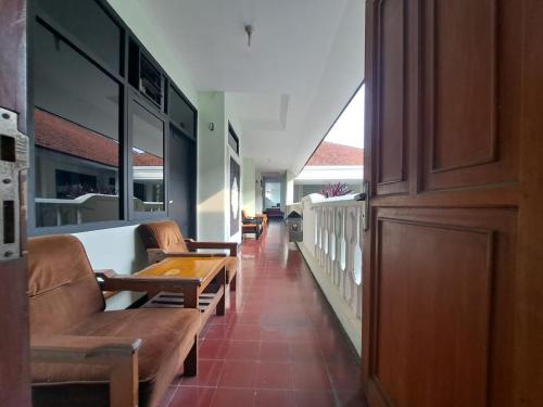 Imagen general del Hotel Capital O 94108 Abadi. Foto 15