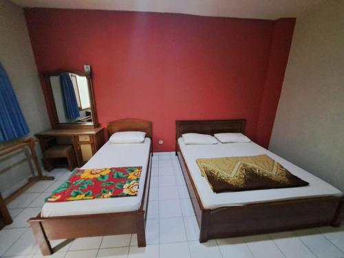 Imagen general del Hotel Capital O 94108 Abadi. Foto 17