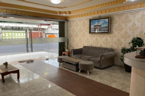 Imagen general del Hotel Capital O 94156 Gemudi Gold Islami. Foto 2