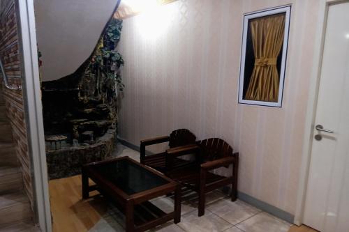 Imagen general del Hotel Capital O 94156 Gemudi Gold Islami. Foto 8
