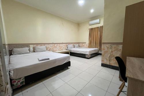 Imagen general del Hotel Capital O 94240 Asoka Syariah. Foto 15