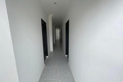 Imagen general del Hotel Capital O 94254 Dental Inn. Foto 12