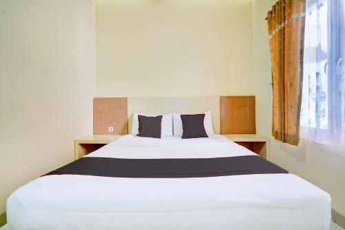 Imagen de la habitación del Hotel Capital O 94350 Rumah Suka Homestay. Foto 20