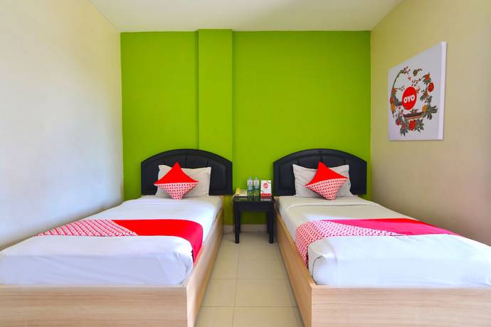 Imagen de la habitación del Hotel Capital O 988 Kapuas Dharma 2. Foto 3