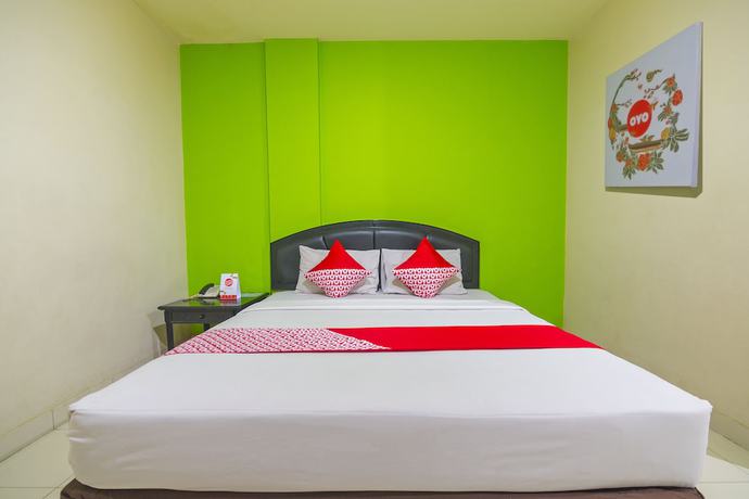 Imagen de la habitación del Hotel Capital O 988 Kapuas Dharma 2. Foto 7