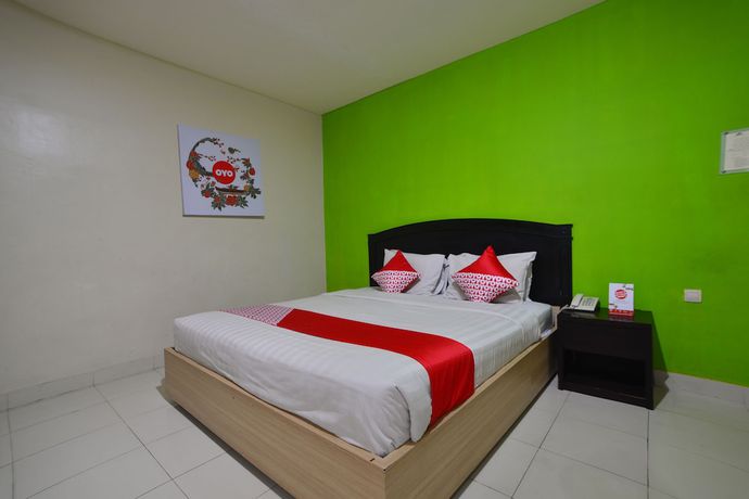 Imagen de la habitación del Hotel Capital O 988 Kapuas Dharma 2. Foto 9