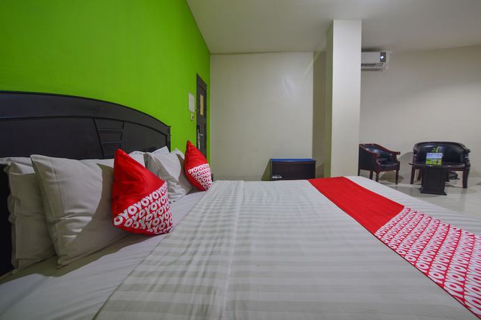 Imagen de la habitación del Hotel Capital O 988 Kapuas Dharma 2. Foto 11