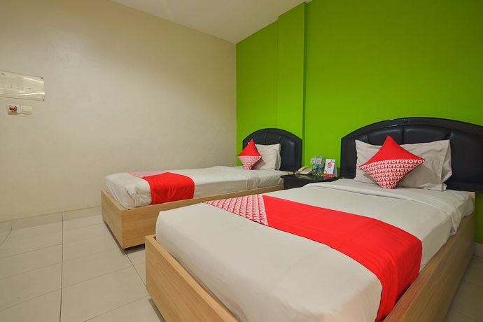 Imagen de la habitación del Hotel Capital O 988 Kapuas Dharma 2. Foto 12