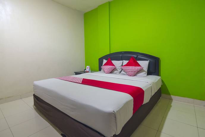 Imagen de la habitación del Hotel Capital O 988 Kapuas Dharma 2. Foto 13