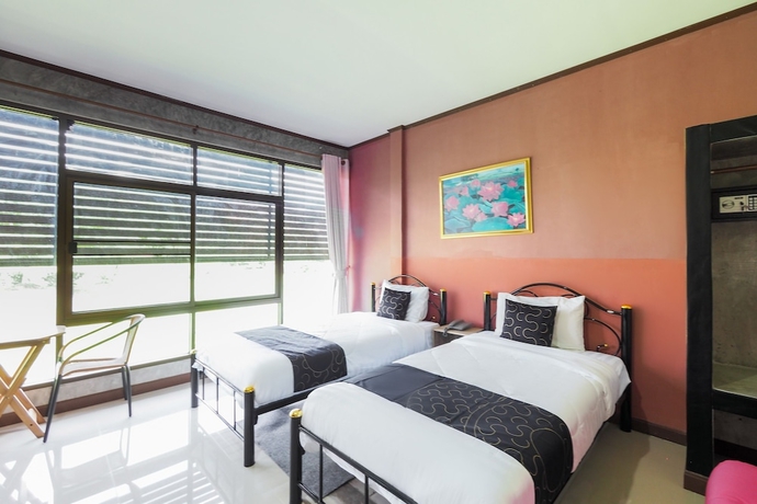 Imagen de la habitación del Hotel Capital O 997 Hug Lom Doi. Foto 2