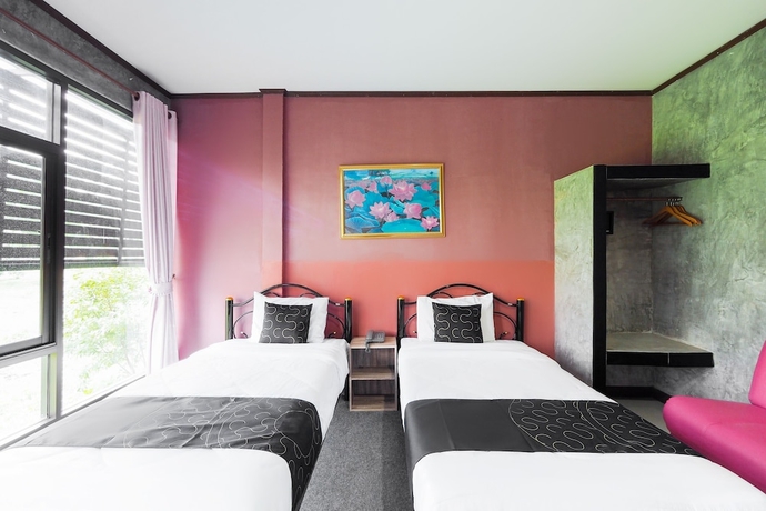 Imagen de la habitación del Hotel Capital O 997 Hug Lom Doi. Foto 3
