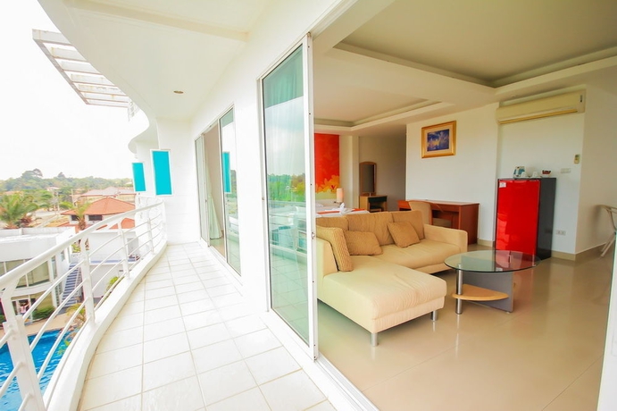 Imagen de la habitación del Hotel Capital O 998 The Magnolias Pattaya Boutique Resort. Foto 9