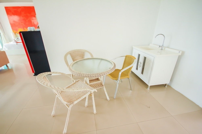 Imagen de la habitación del Hotel Capital O 998 The Magnolias Pattaya Boutique Resort. Foto 10