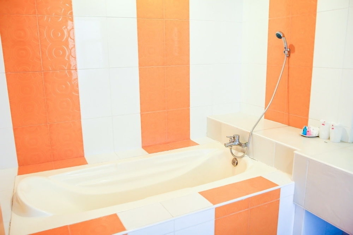 Imagen de la habitación del Hotel Capital O 998 The Magnolias Pattaya Boutique Resort. Foto 11