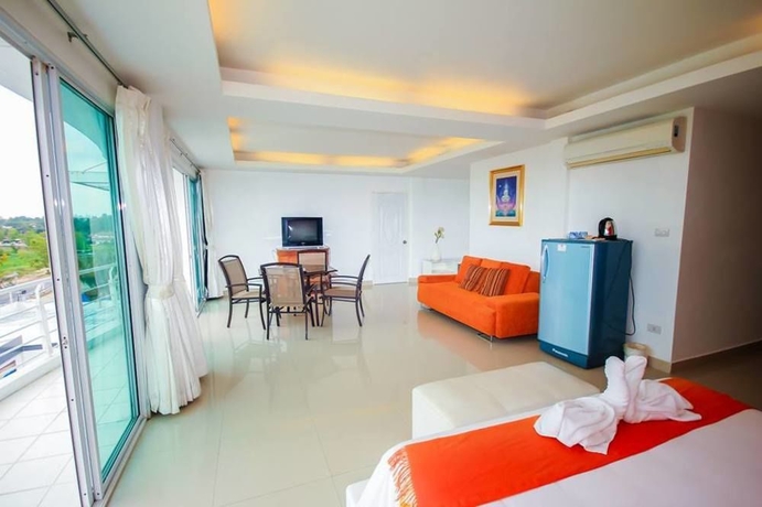 Imagen de la habitación del Hotel Capital O 998 The Magnolias Pattaya Boutique Resort. Foto 13