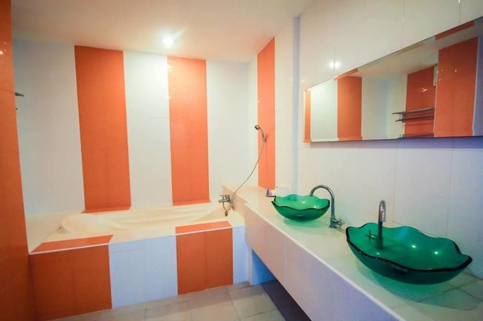 Imagen de la habitación del Hotel Capital O 998 The Magnolias Pattaya Boutique Resort. Foto 14