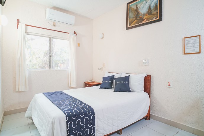 Imagen de la habitación del Hotel Capital O Balun Canan, Tuxtla Guti&eacute;rrez. Foto 12