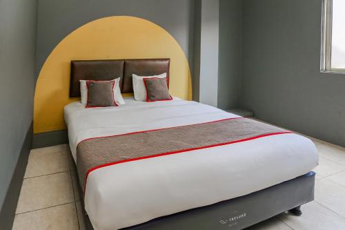 Imagen general del Hotel Capital O Bimo Slipi. Foto 11
