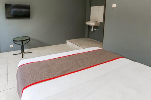 Imagen general del Hotel Capital O Bimo Slipi. Foto 13