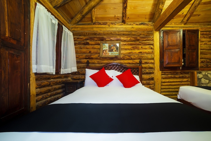 Imagen de la habitación del Hotel Capital O Caba&ntilde;as El Rinc&oacute;n. Foto 2