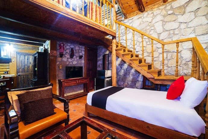 Imagen de la habitación del Hotel Capital O Caba&ntilde;as El Rinc&oacute;n. Foto 3