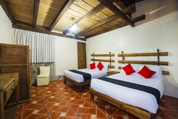 Imagen de la habitación del Hotel Capital O Caba&ntilde;as El Rinc&oacute;n. Foto 8