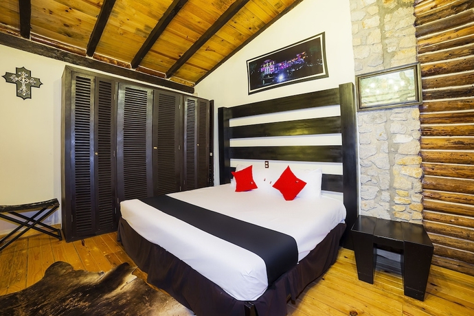 Imagen de la habitación del Hotel Capital O Caba&ntilde;as El Rinc&oacute;n. Foto 10