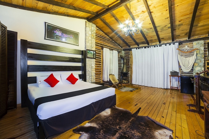 Imagen de la habitación del Hotel Capital O Caba&ntilde;as El Rinc&oacute;n. Foto 11