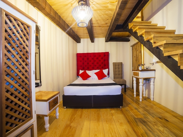 Imagen de la habitación del Hotel Capital O Caba&ntilde;as El Rinc&oacute;n. Foto 12