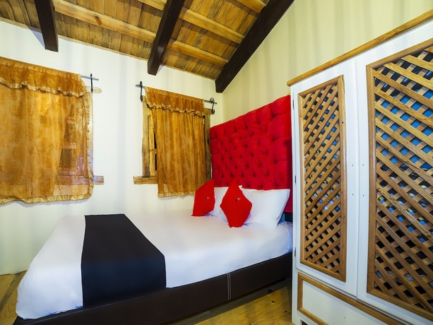 Imagen de la habitación del Hotel Capital O Caba&ntilde;as El Rinc&oacute;n. Foto 13