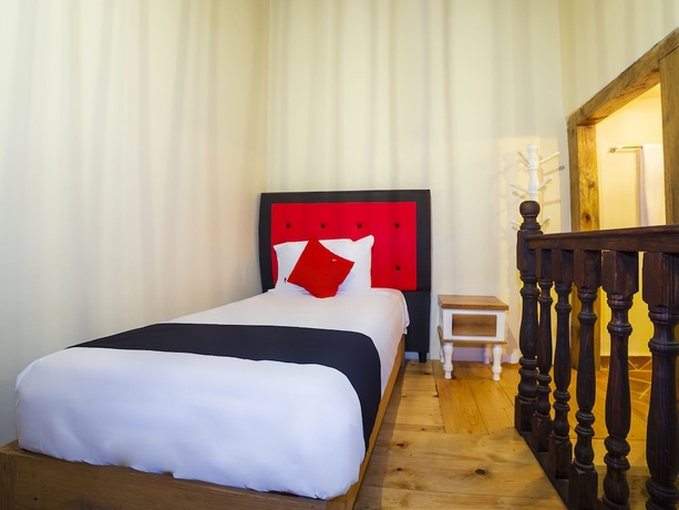 Imagen de la habitación del Hotel Capital O Caba&ntilde;as El Rinc&oacute;n. Foto 14